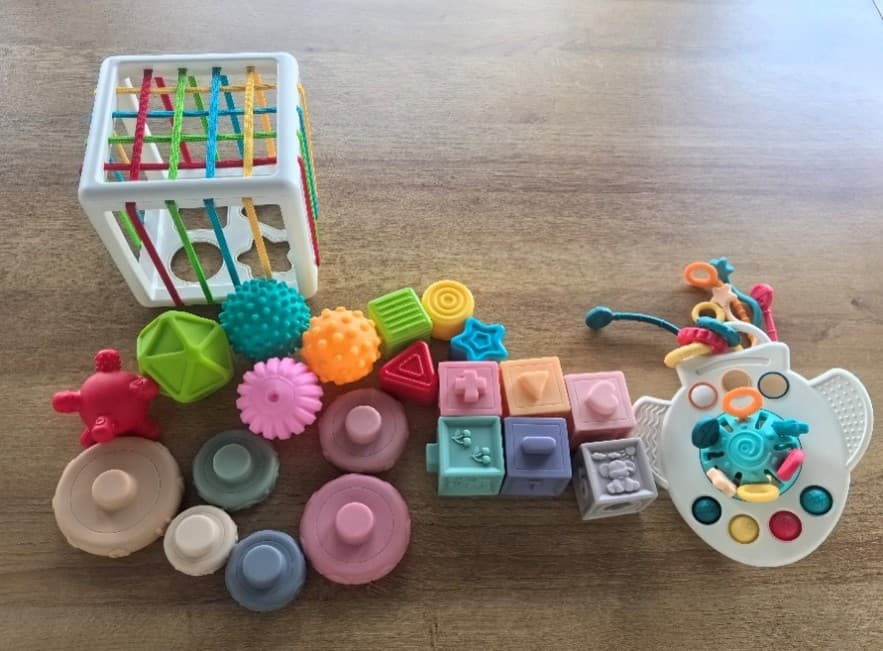 Recalled SpringFlower 5-in-1 Montessori Toy Set — The Montessori toy sets contain an airplane shaped teething toy that has…