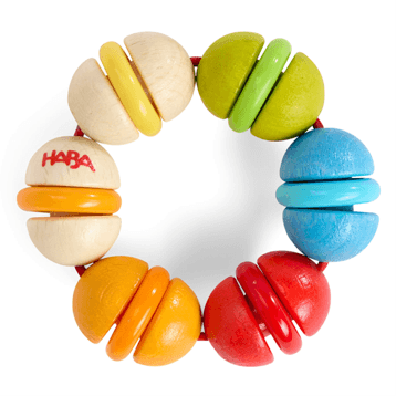 Recalled HABA Rainbow Rattle Grasping and Teething Toy: The glued knot on the elastic cord can become untied on the recalled…